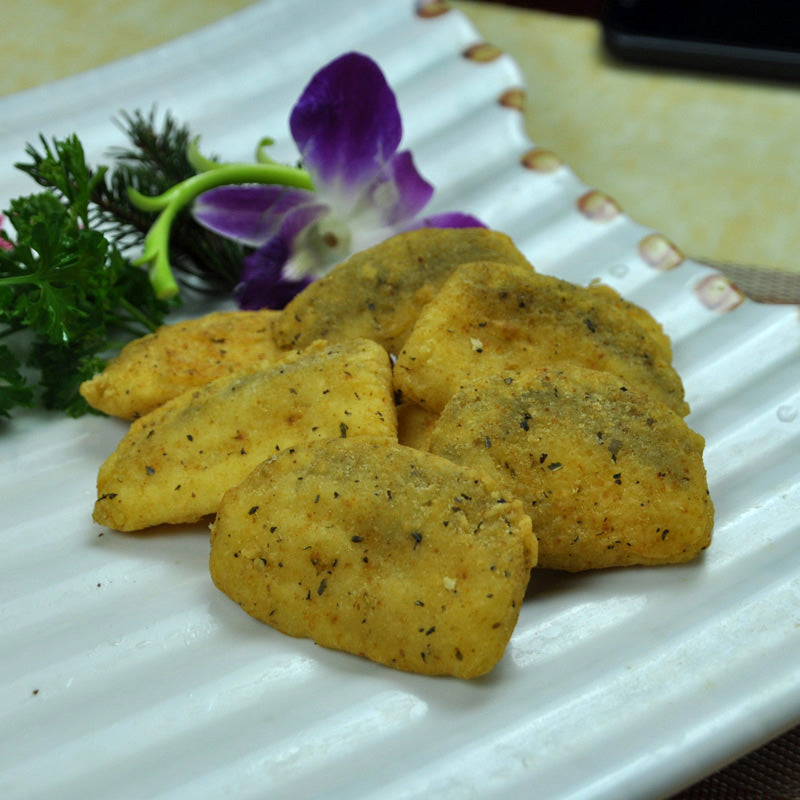Salt and pepper pangasius portion